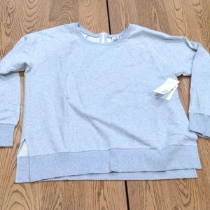 New with Tag Zella Terry sweatshirt with back zipper. Large